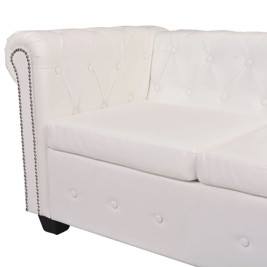 Capitonnage et clous du canapé Chesterfield 5 places en détail