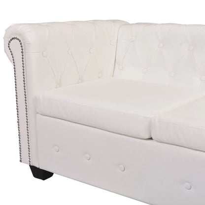 Capitonnage et clous du canapé Chesterfield 5 places en détail